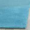 Mandy Solid Tufted Rug - Safavieh