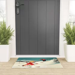 The Whiskey Ginger Retro Skiing Couple Welcome Mat - Society6